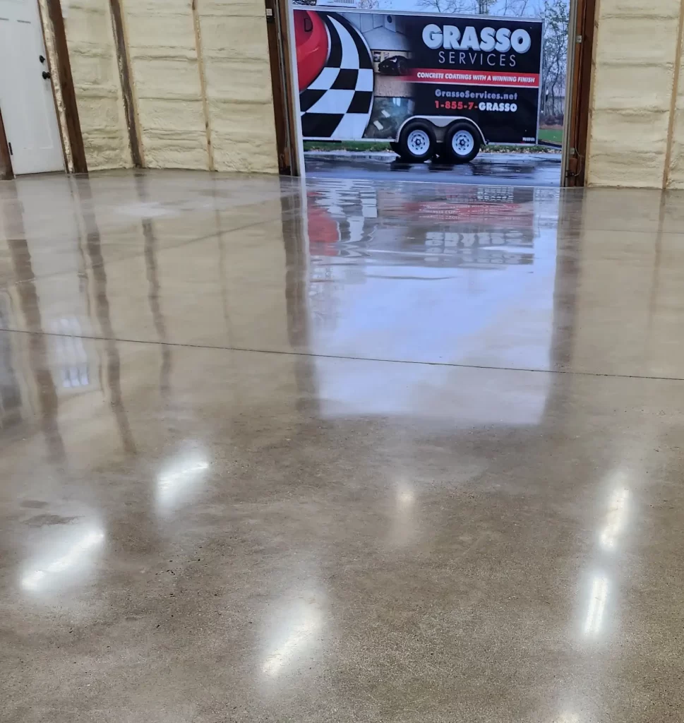 Garage Floor polished concrete with grasso services truck in background