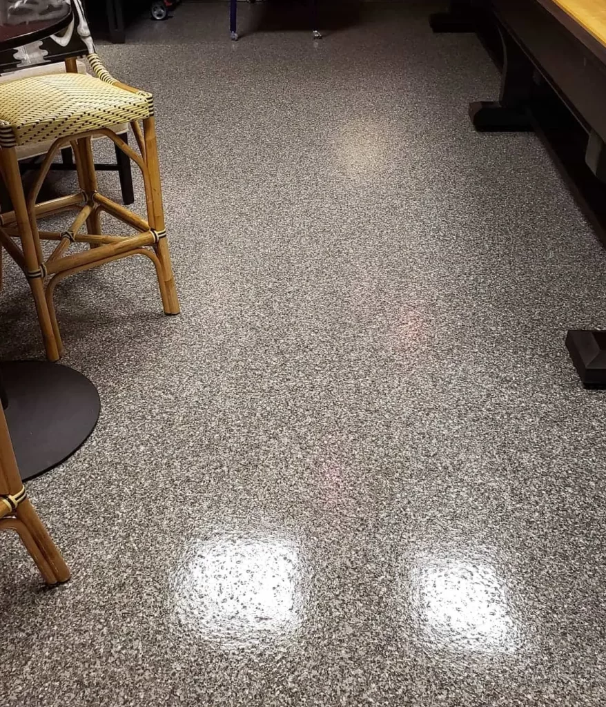Basement Floor with Shadow Color flakes and clear polyaspartic top coat